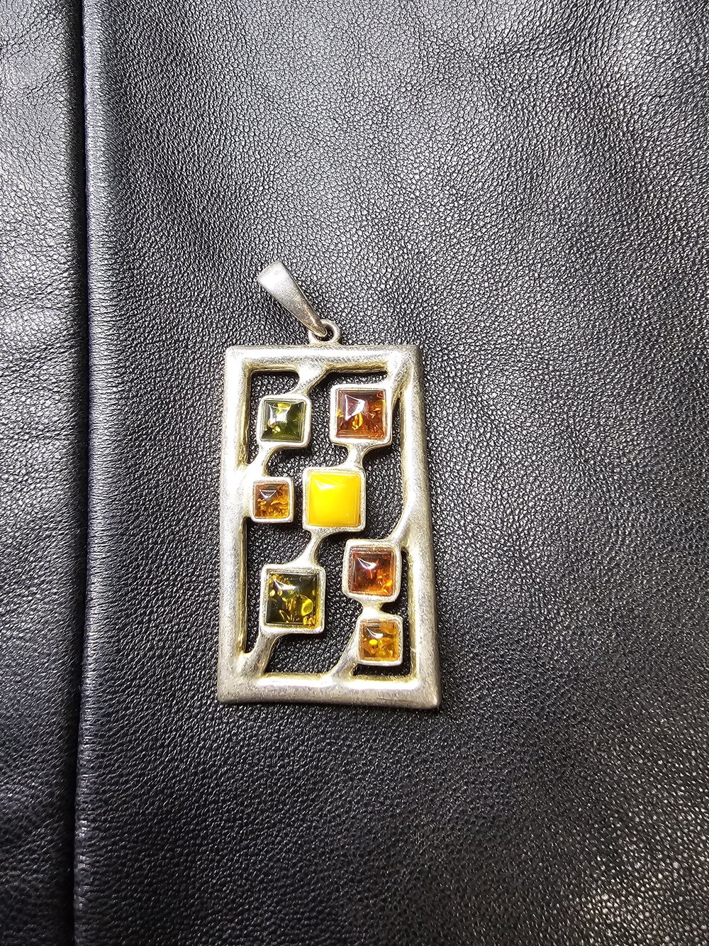 Handcrafted Sterling Silver Pendant with Amber Gemstones